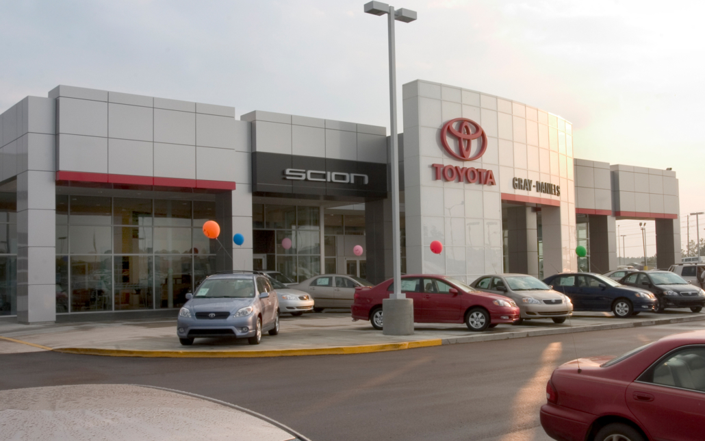 A Toyota dealership in the afternoon sun