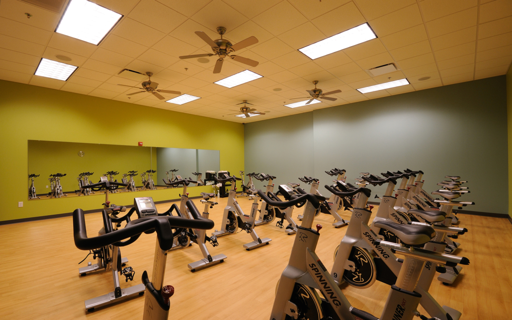 A room full of cycling exercise equipment