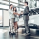 Image of a couple buying a car at a dealership.